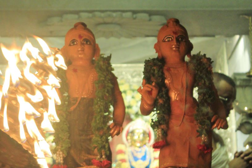 Sri Krishna and Balarama receiving Arati
